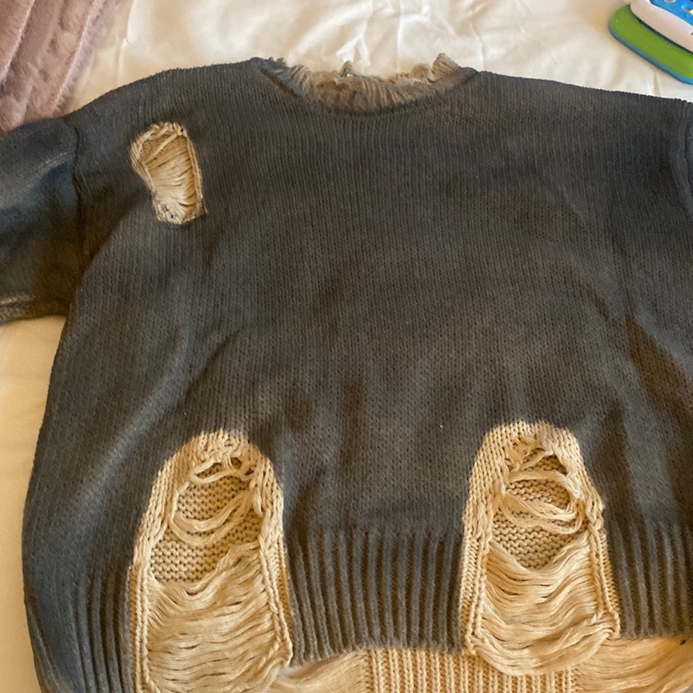 Brand new never worn. Distressed sweater